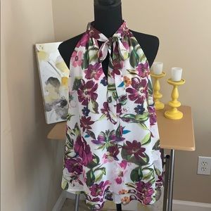 NWT size large women’s sleeveless blouse with bow